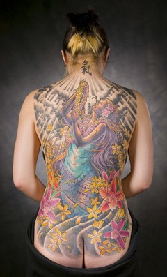sexy girl with japanese tattoo on back body, full tattoo on the body, flower tattoo on lower back tattoo, butterfly tattoo on arm and flower tattoo
